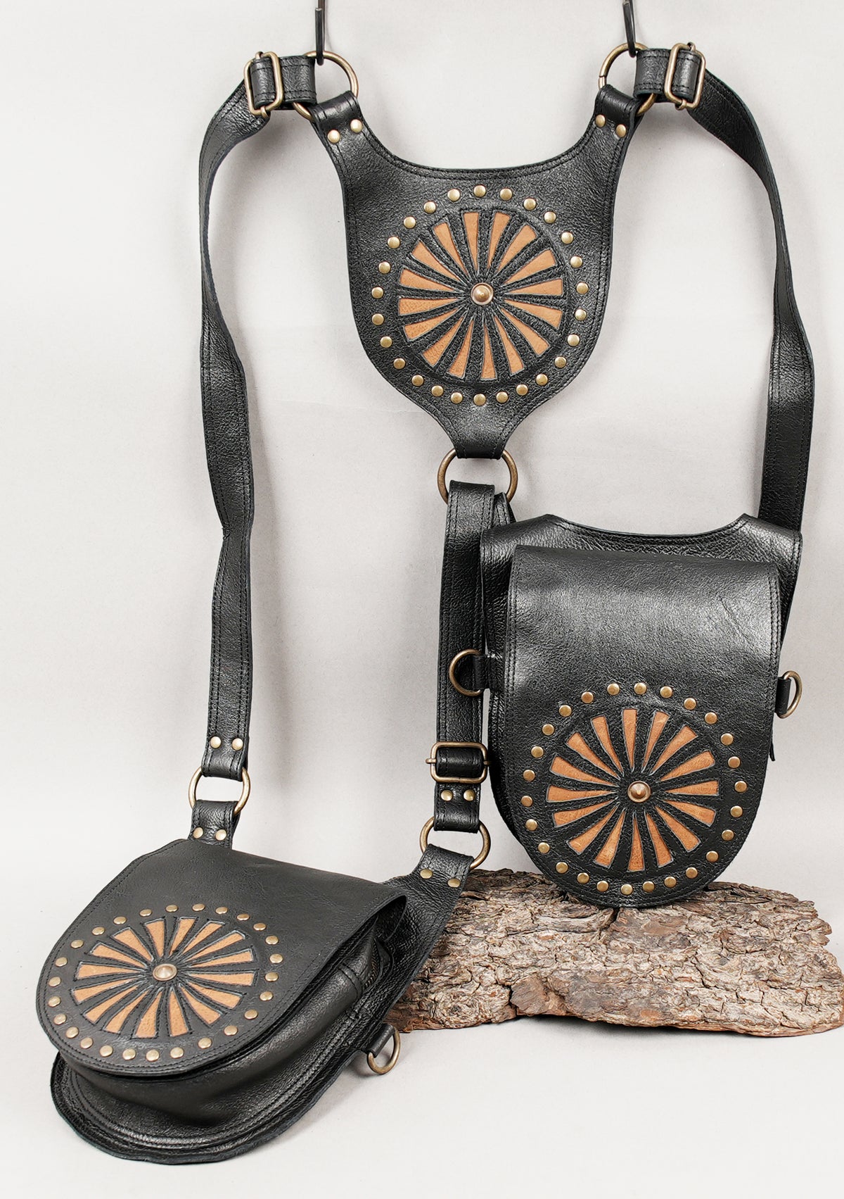 Black leather utility holster bag with antique brass hardware