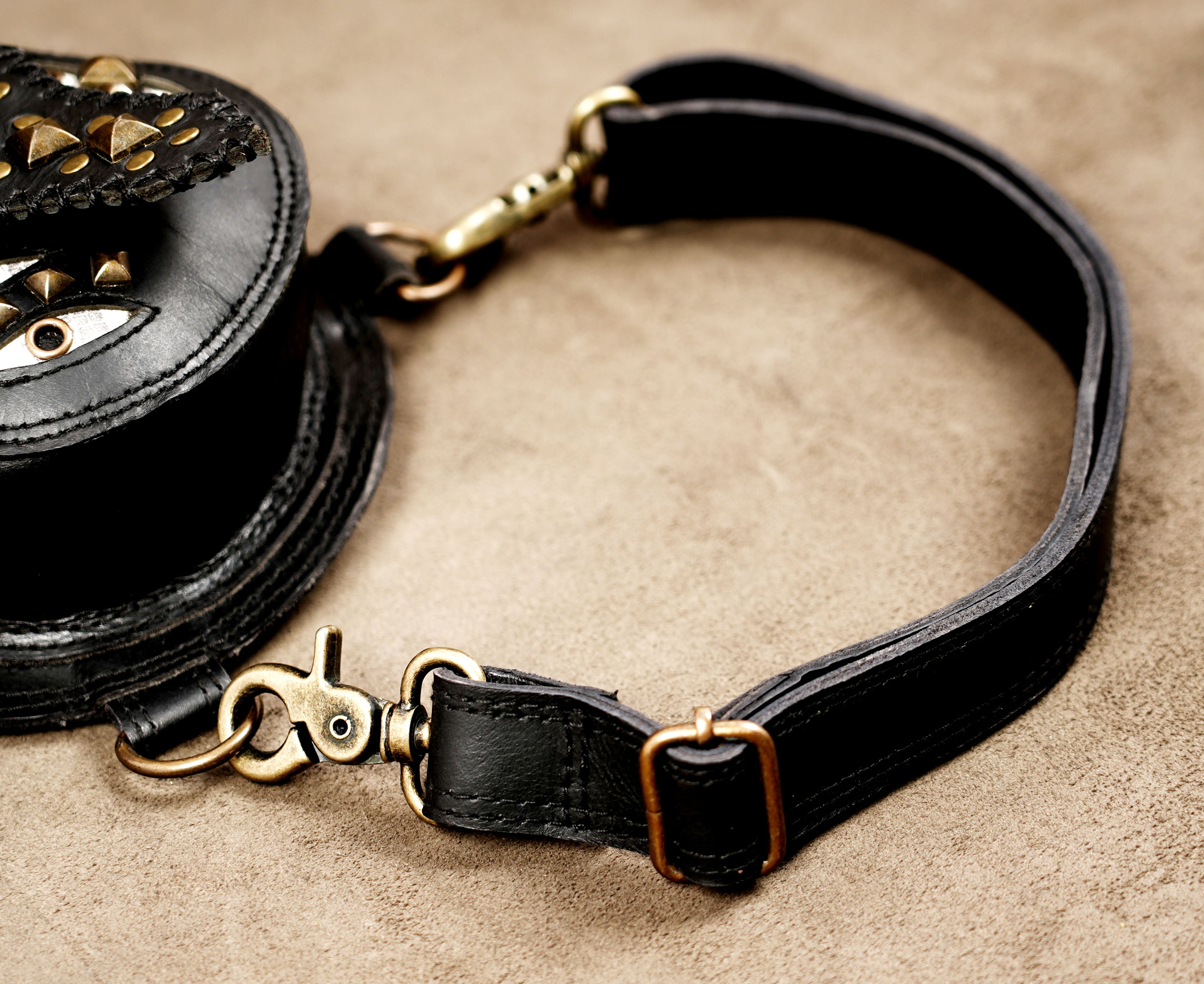 Studded black leather hip bag with adjustable waist strap
