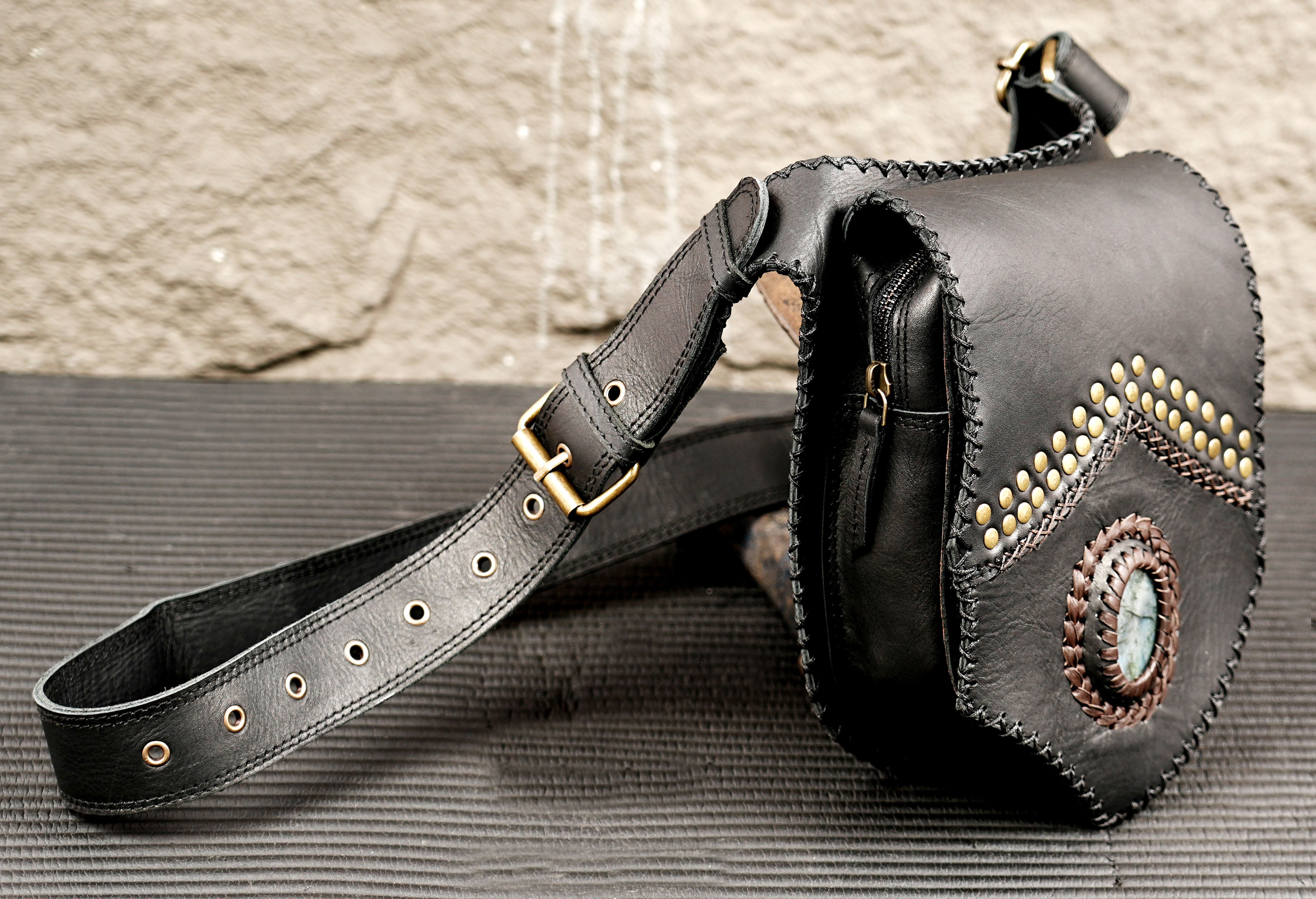 Studded leather hip bag for concerts, travel and outdoor events