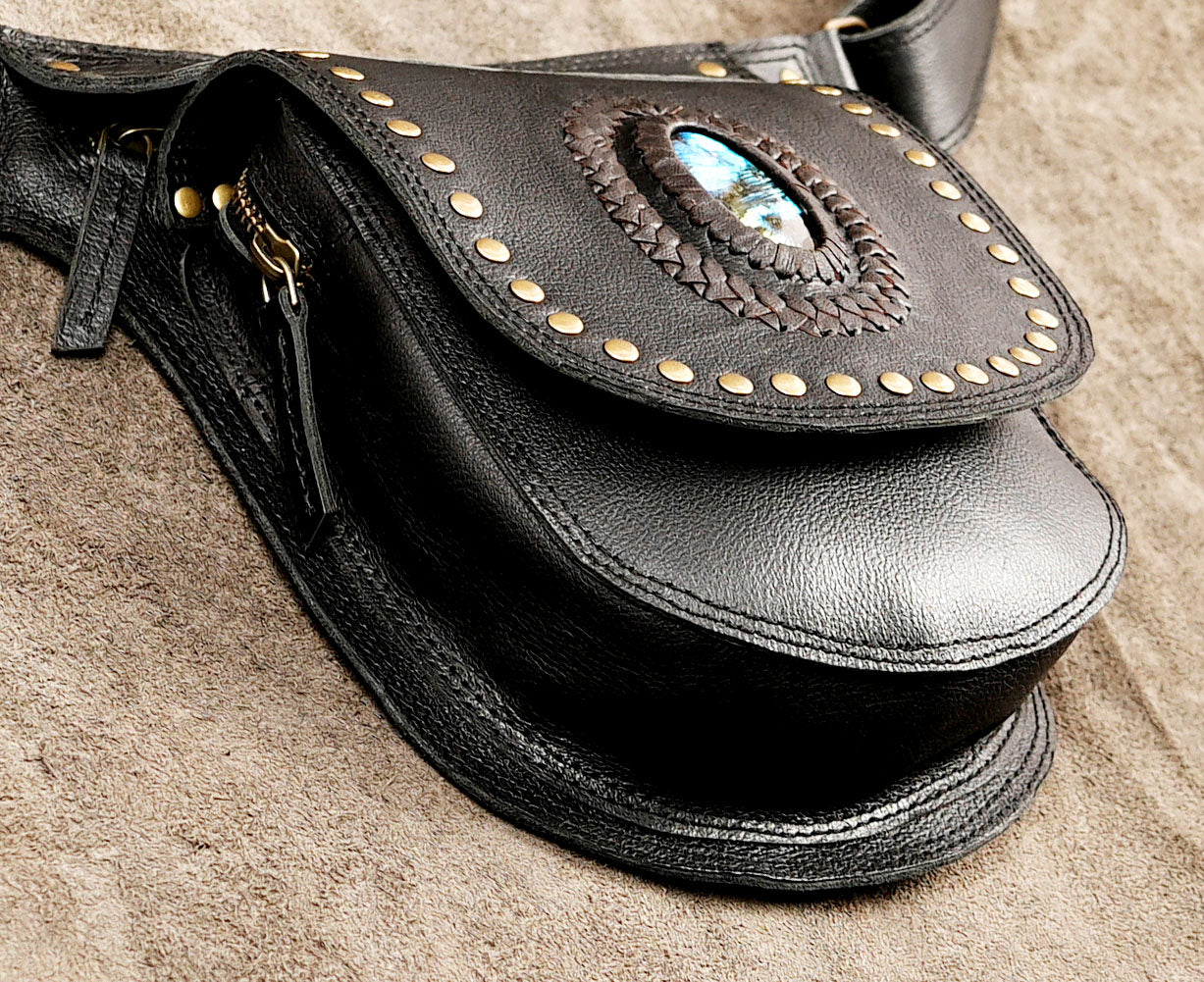 Studded leather pouch with natural crystal stone and zip pocket