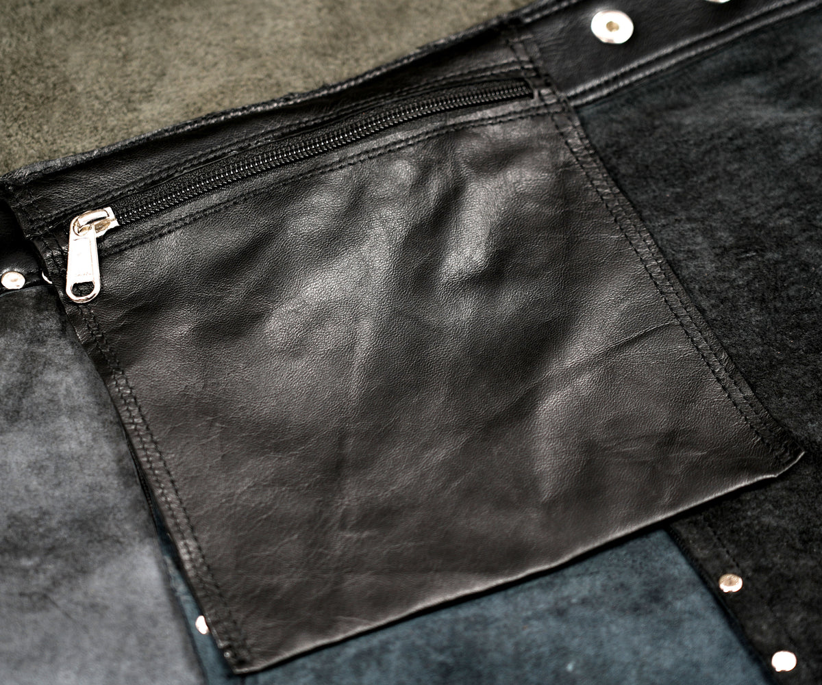 Studded leather skirt with front zipper pocket