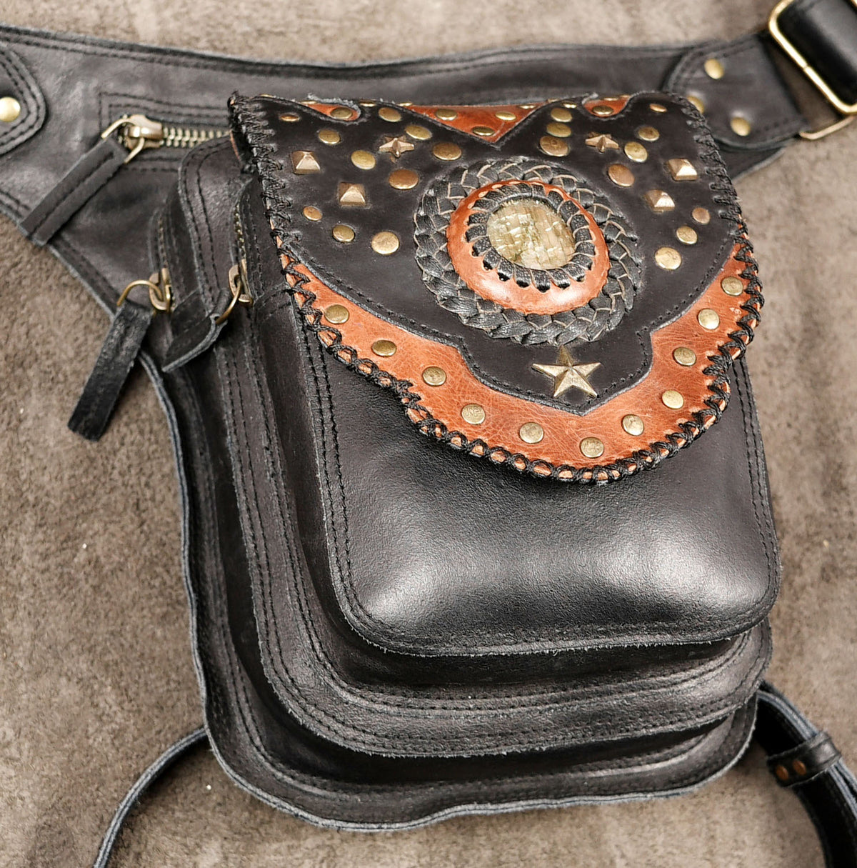 Studded leather thigh bag with leg strap and star detail
