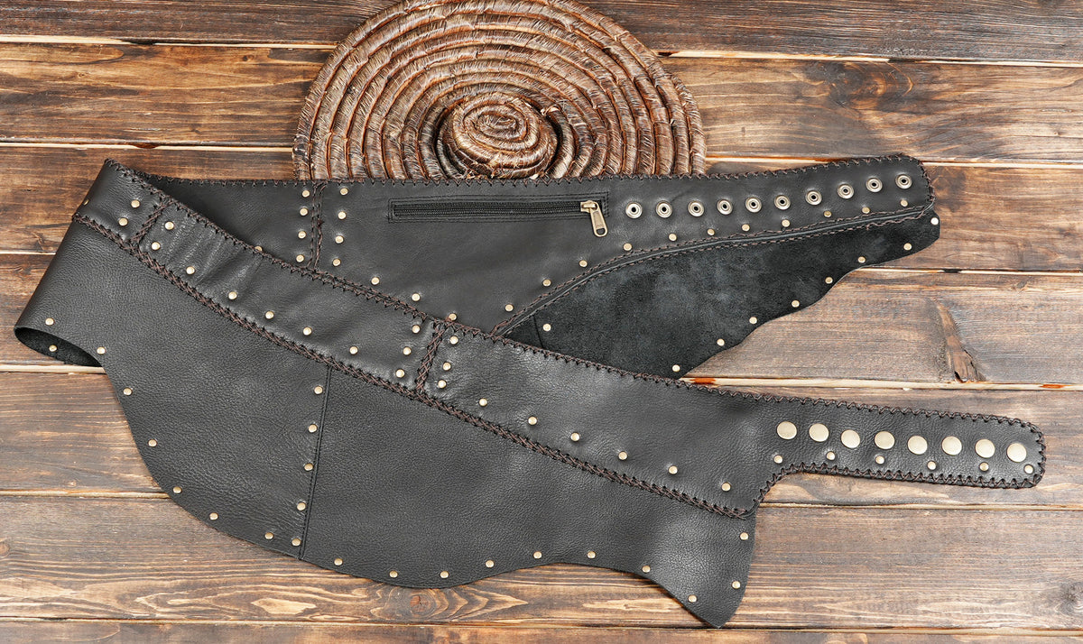 Studded leather wrap skirt styled on wood background