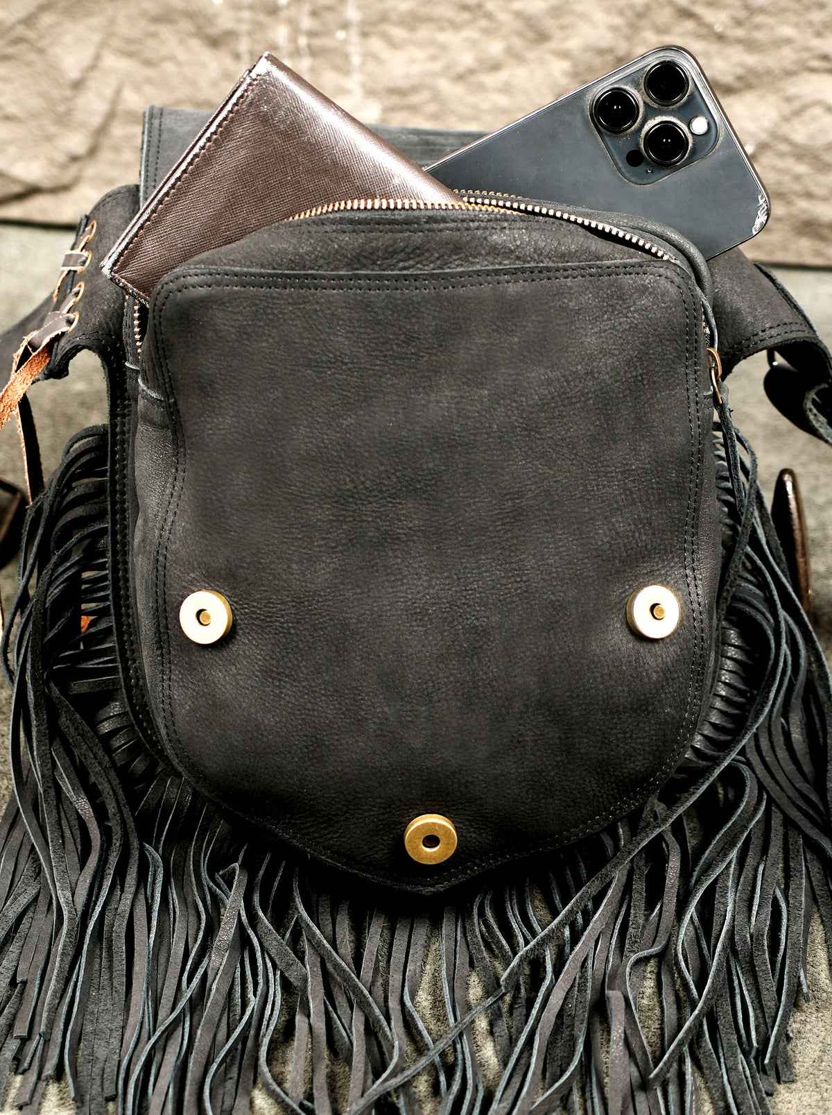 Suede fringe bag with abalone stone