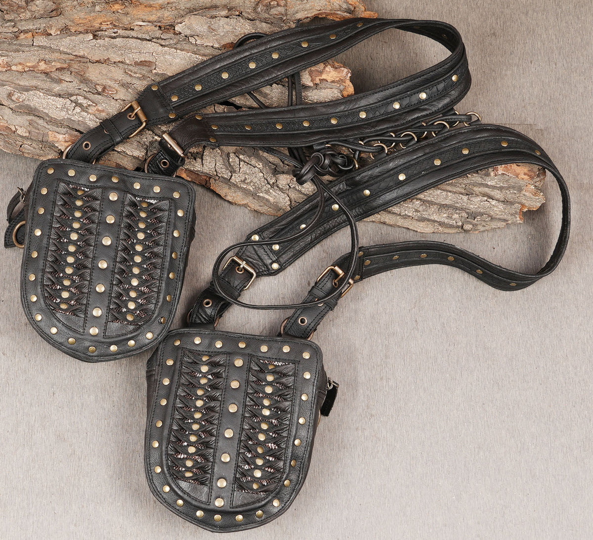 Steampunk gothic thigh harness with embossed black leather straps and metal studs
