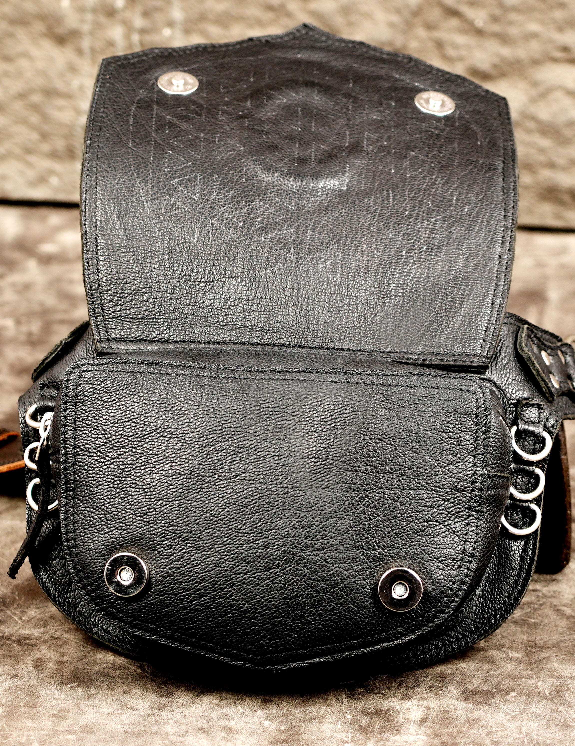 Tan trimmed leather belt with chain and stone detail