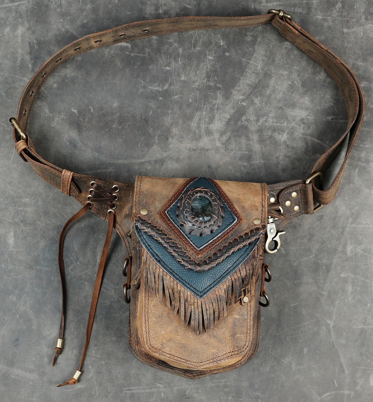 Leather festival utility pouch with fringe flap and adjustable belt