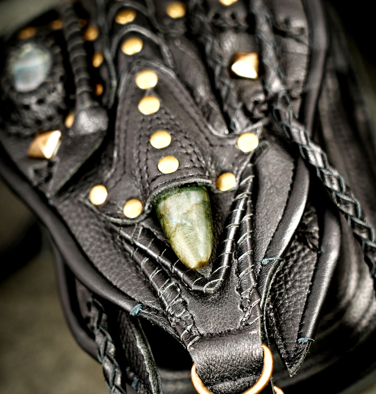 Black leather boho waist belt with studded pockets and brass hardware