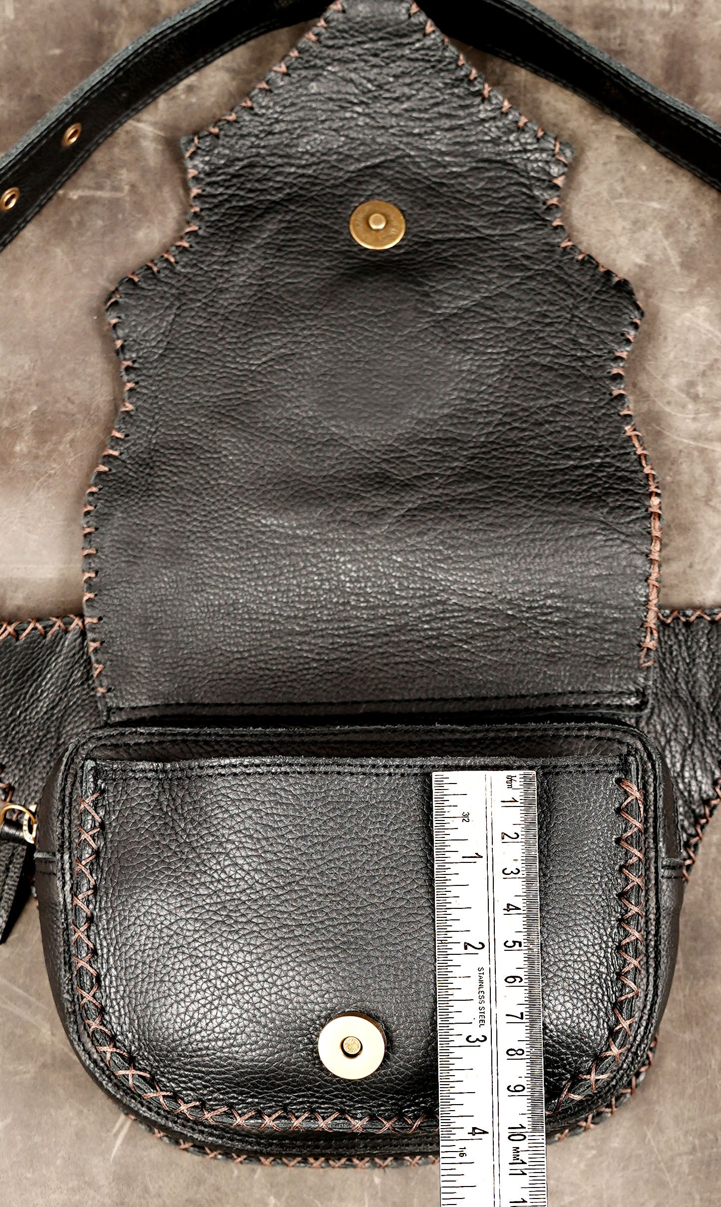 Unique black leather festival bag with antique fittings