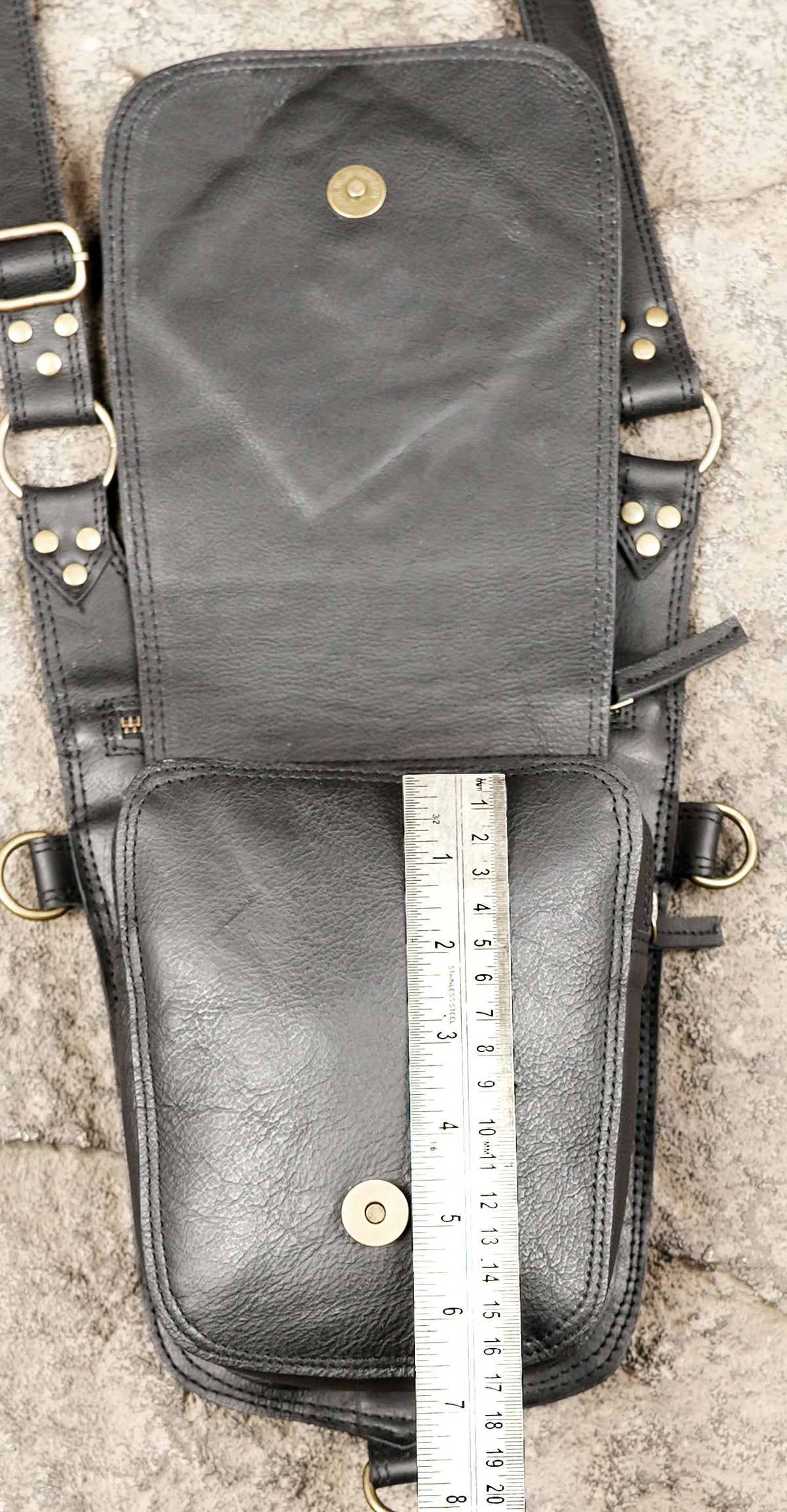 Unisex leather shoulder bag with double holster style pockets