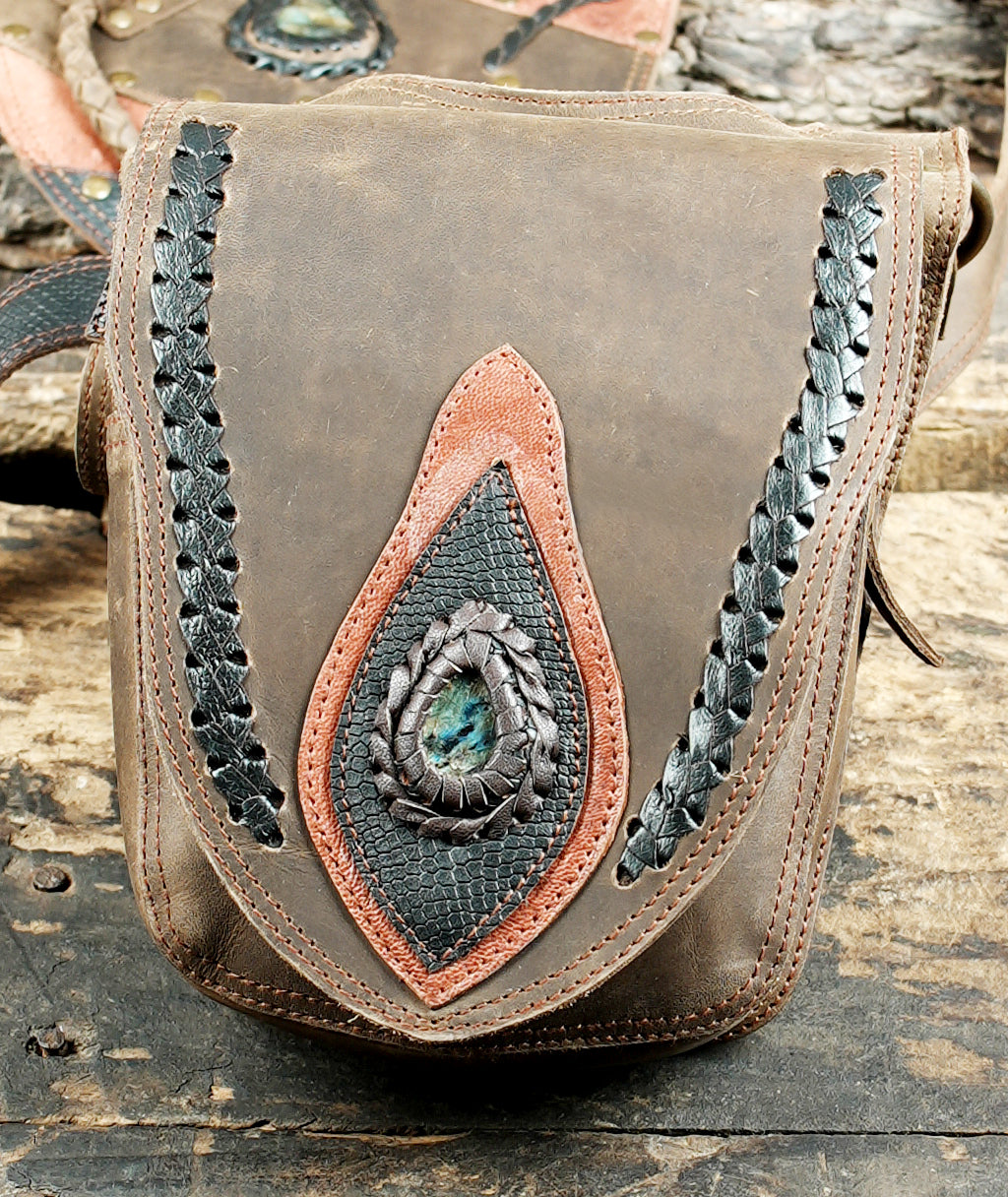 Unisex festival leather harness bag with antique brass hardware and stone accents
 