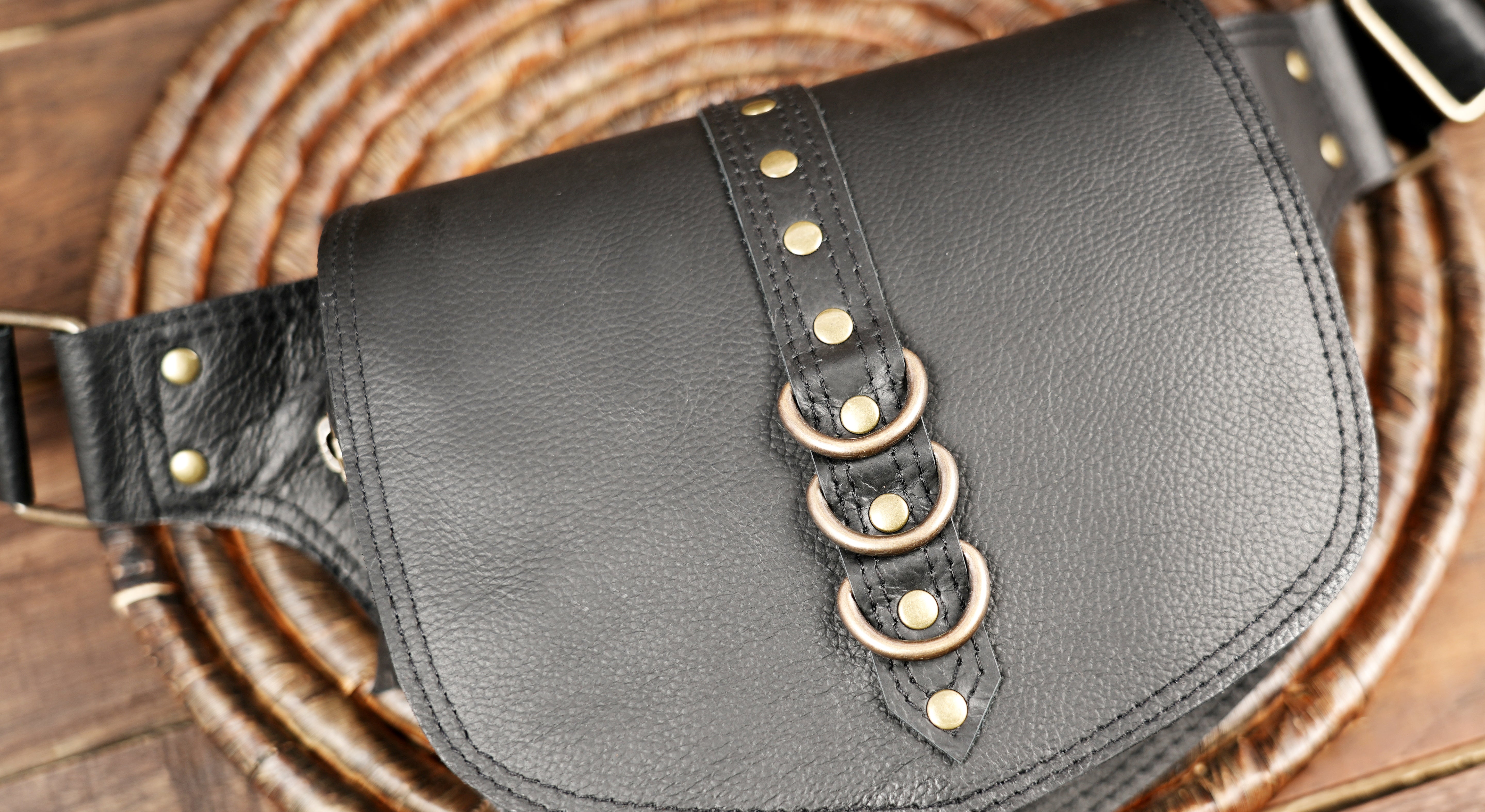Unisex black leather belt bag for travel and daily wear