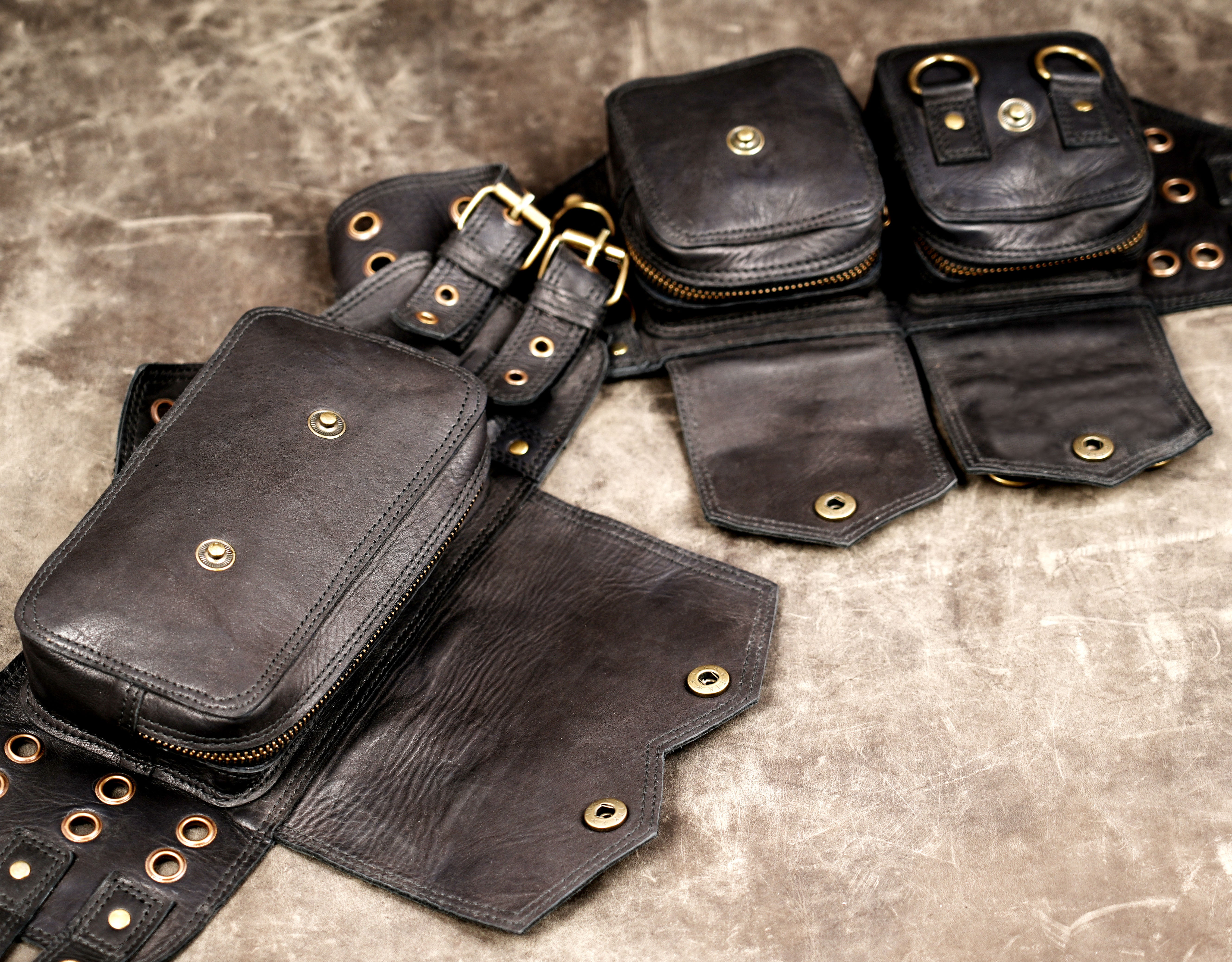 Unisex leather fanny pack with multiple front pockets