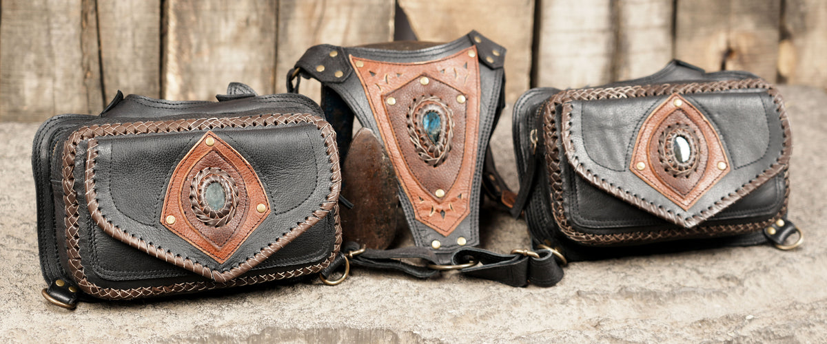 Black leather steampunk shoulder holster with matching side pouches