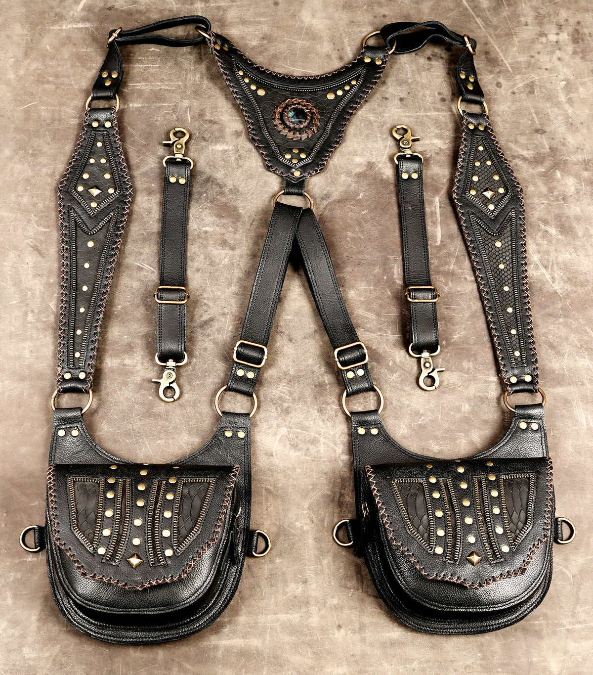 Unisex gothic leather bag harness with matching pouches and metal hardware