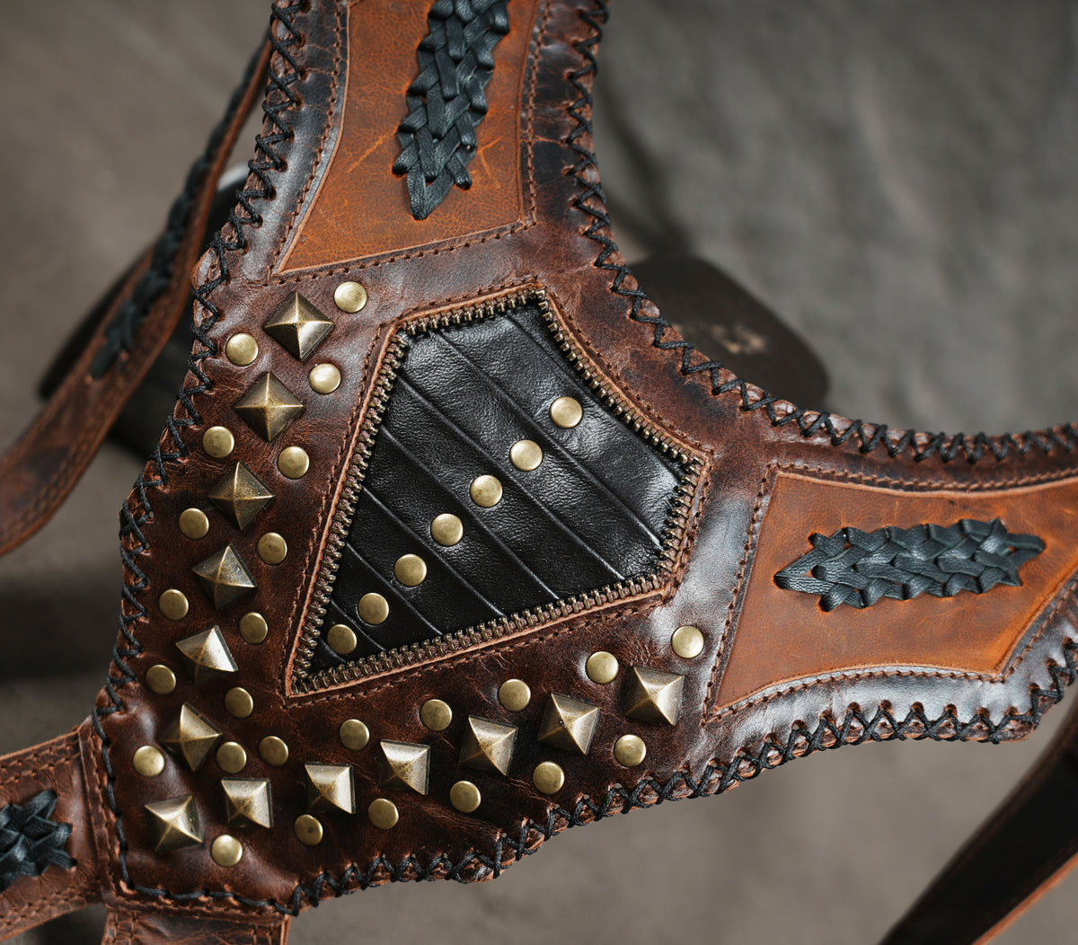 Handcrafted gothic shoulder harness with brown leather pouches and antique brass rings