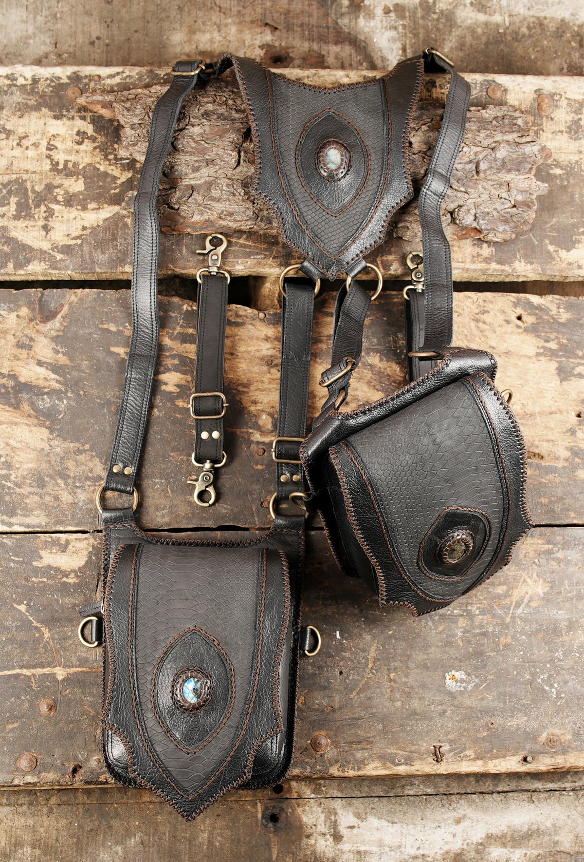 Gothic leather utility rig with dual front pouches and adjustable shoulder straps   