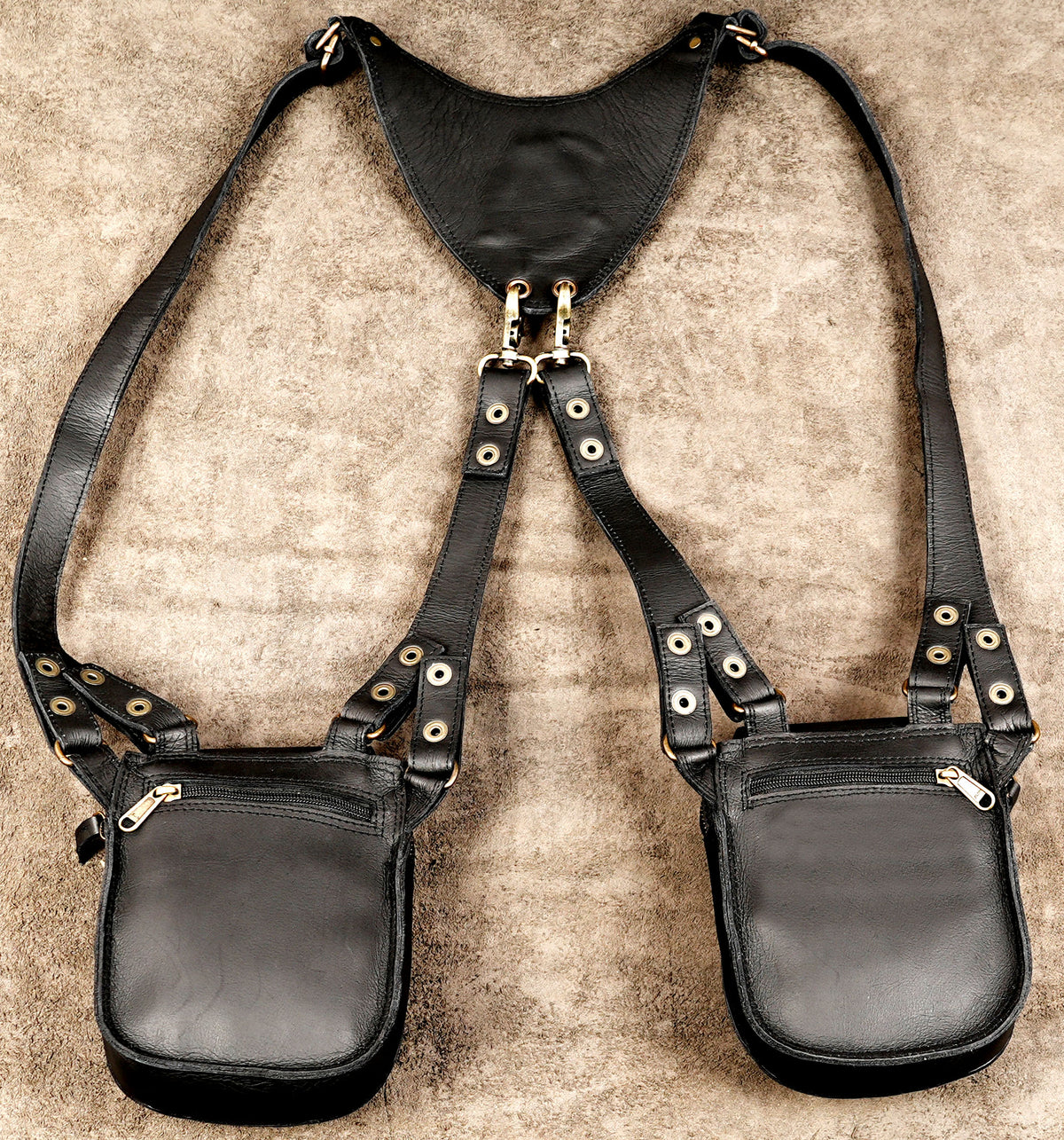 Handmade black leather chest harness bag for festivals and alternative outfits

