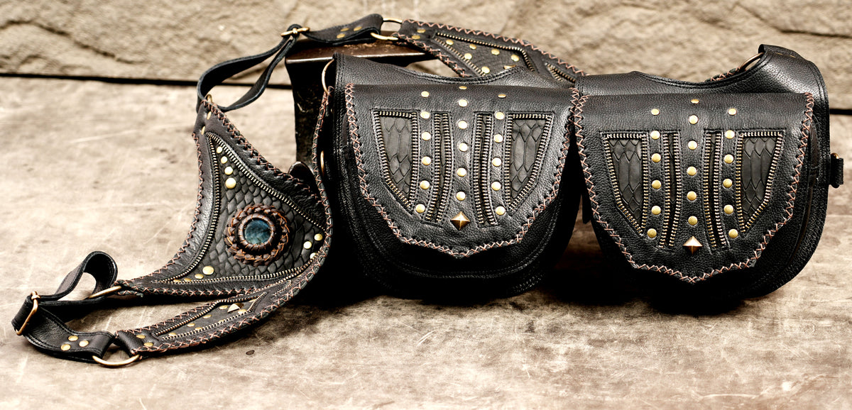 Unisex leather festival harness with two matching black utility bags