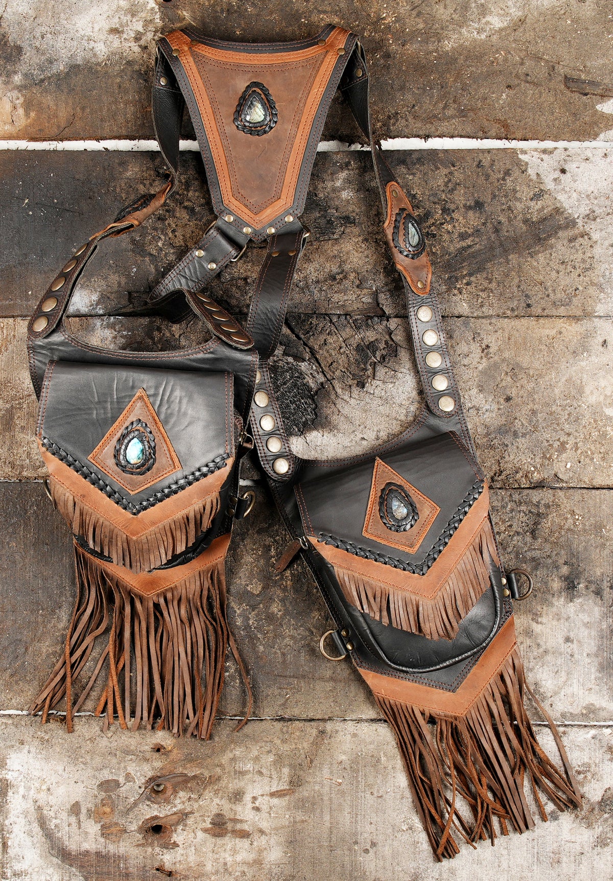 Double leather festival pouch with adjustable harness straps and brass tone hardware