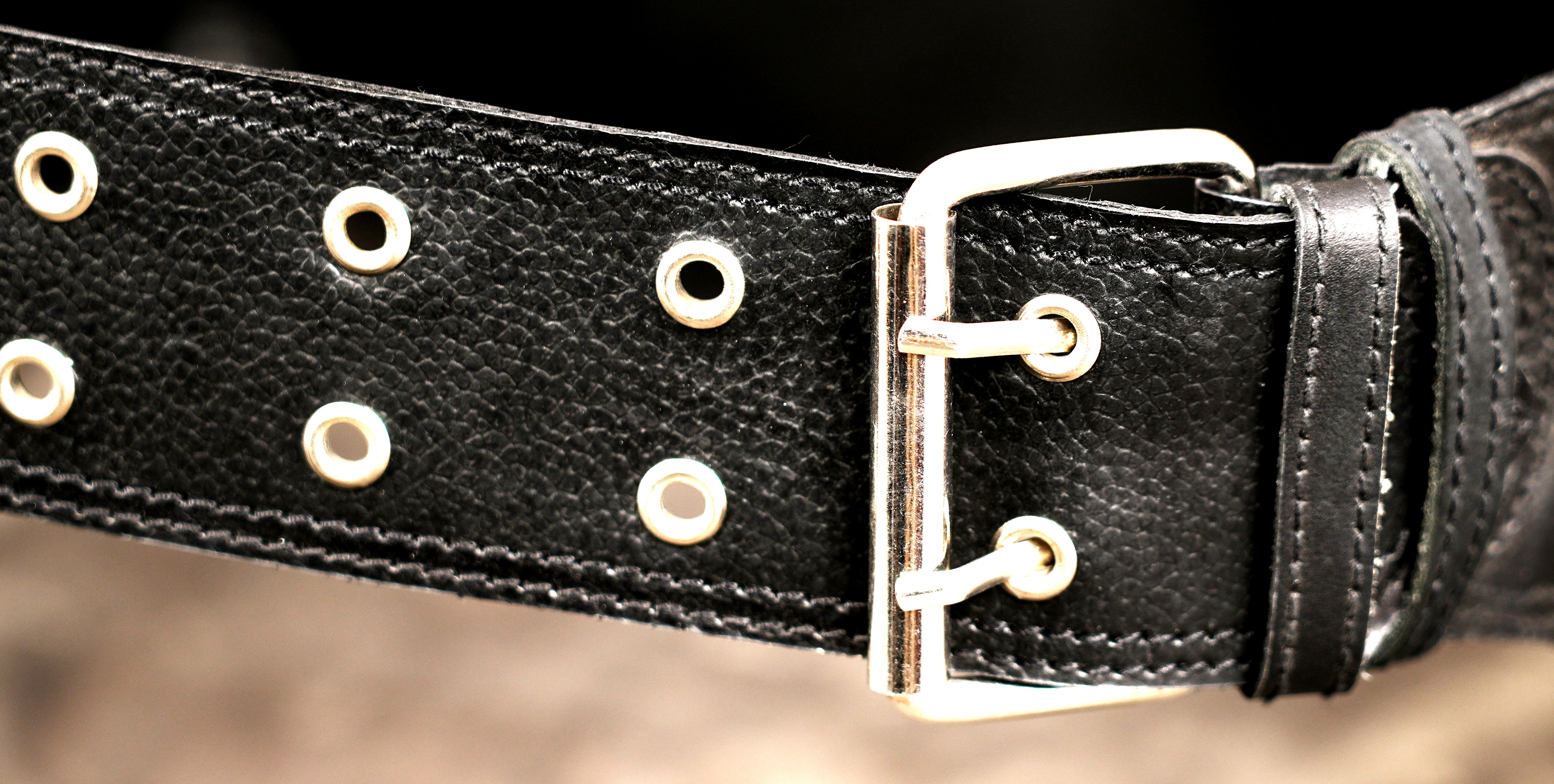 Warrior class leather accessory with scalloped edges