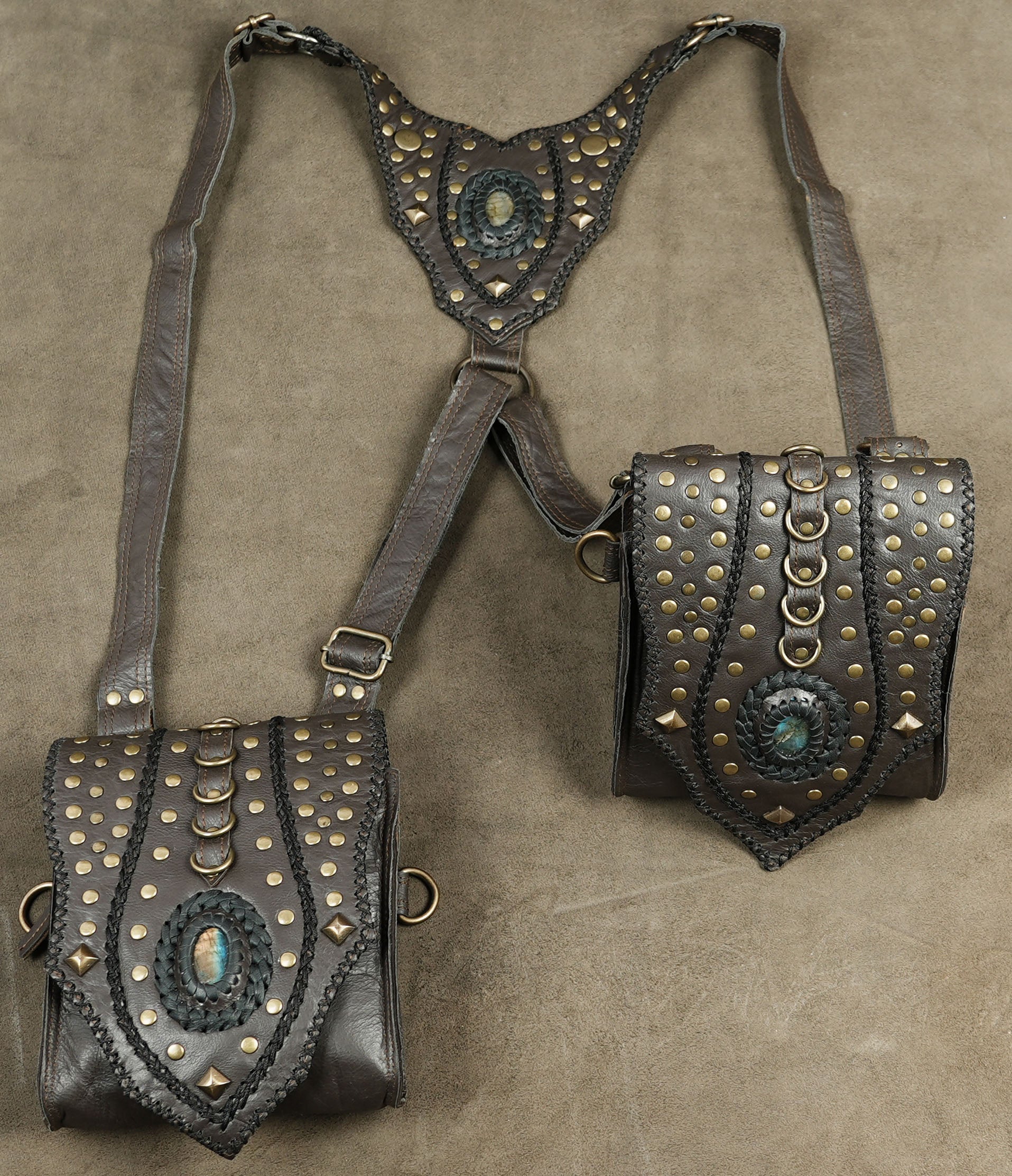 Warrior class leather accessory with studded panels