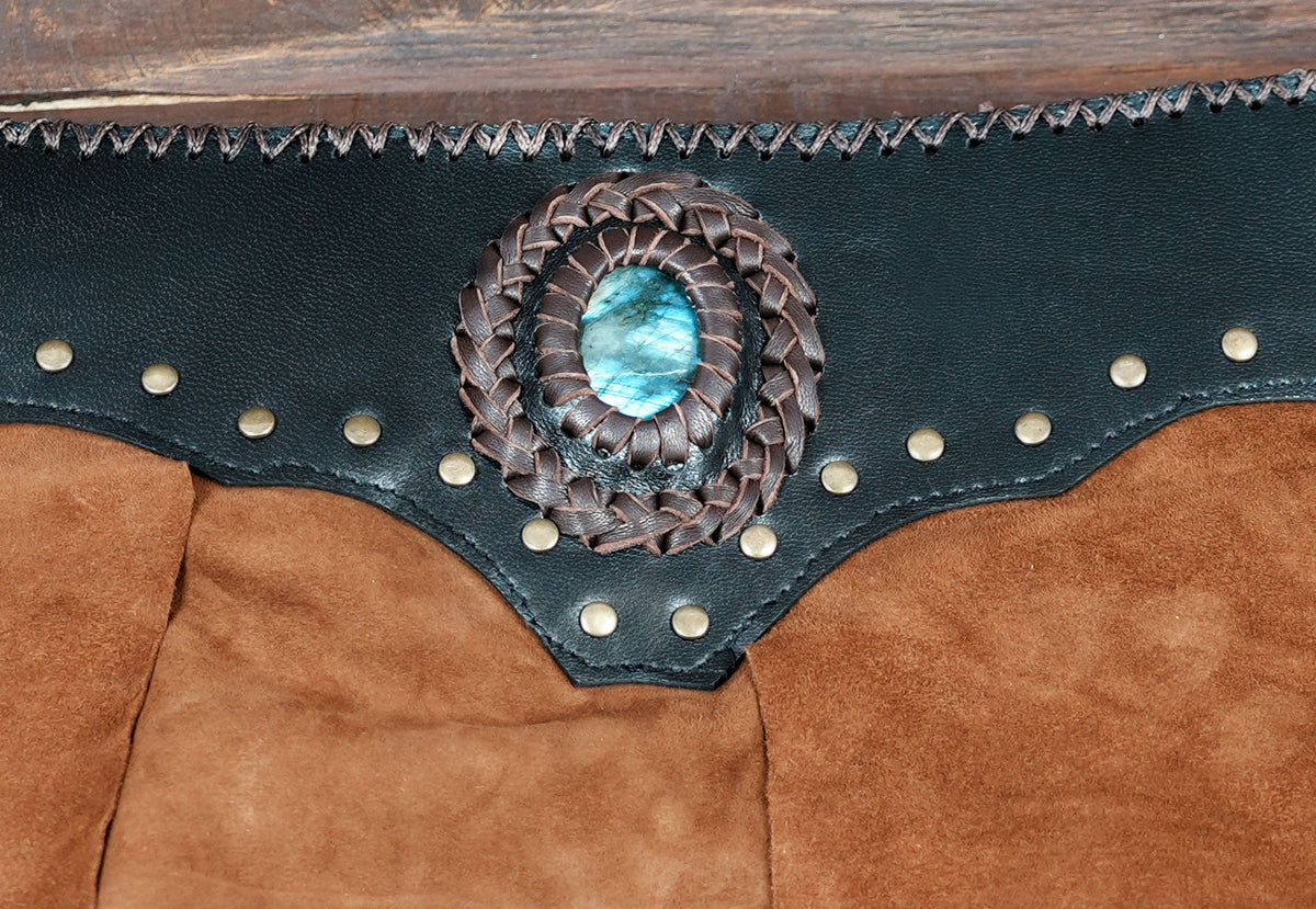 Western boho leather skirt with raw edge hem, flat lay view