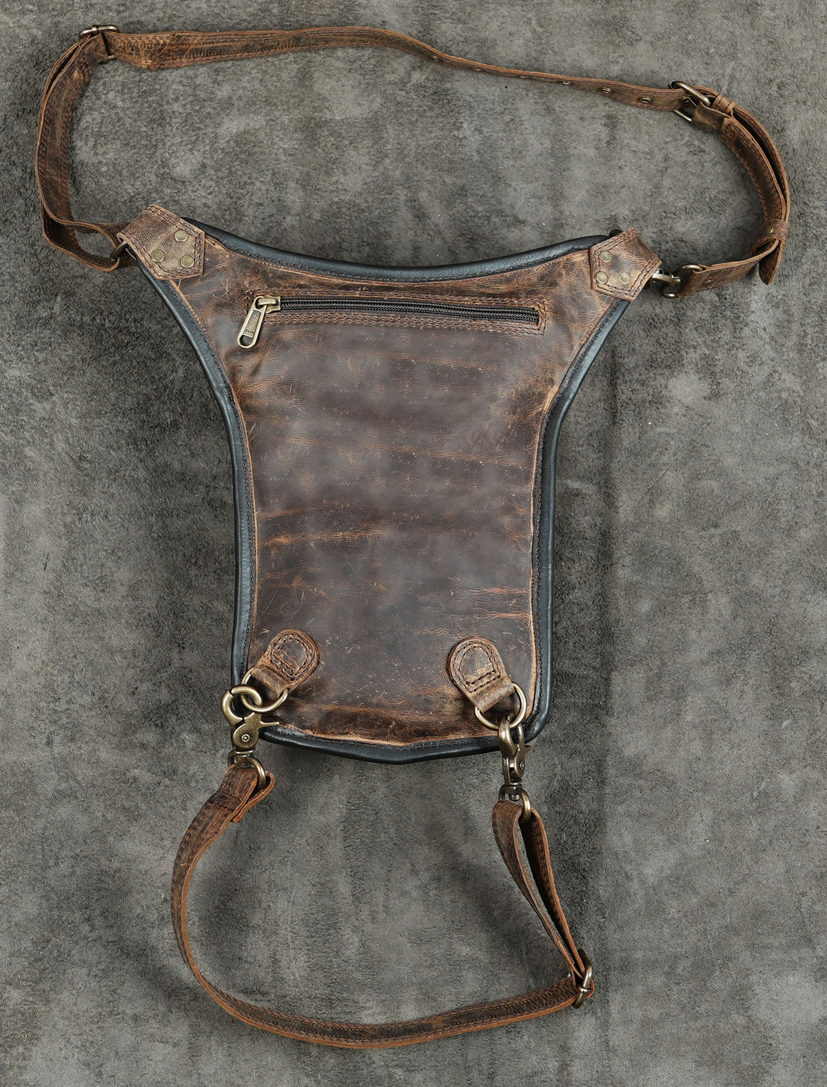 Western inspired tooled leather accessory bag