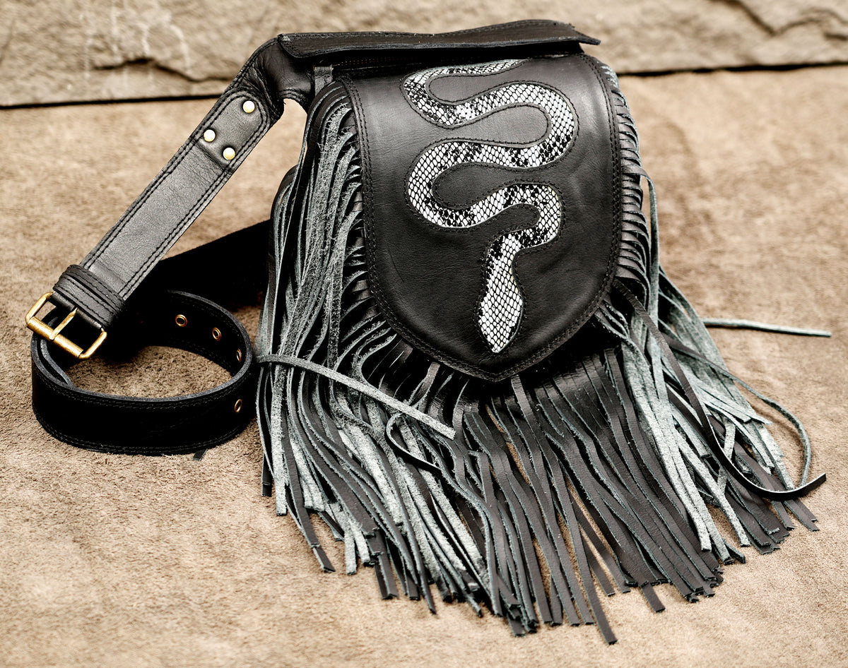 Black leather fringe pouch bag with a silver snakeskin-patterned snake emblem on the front.