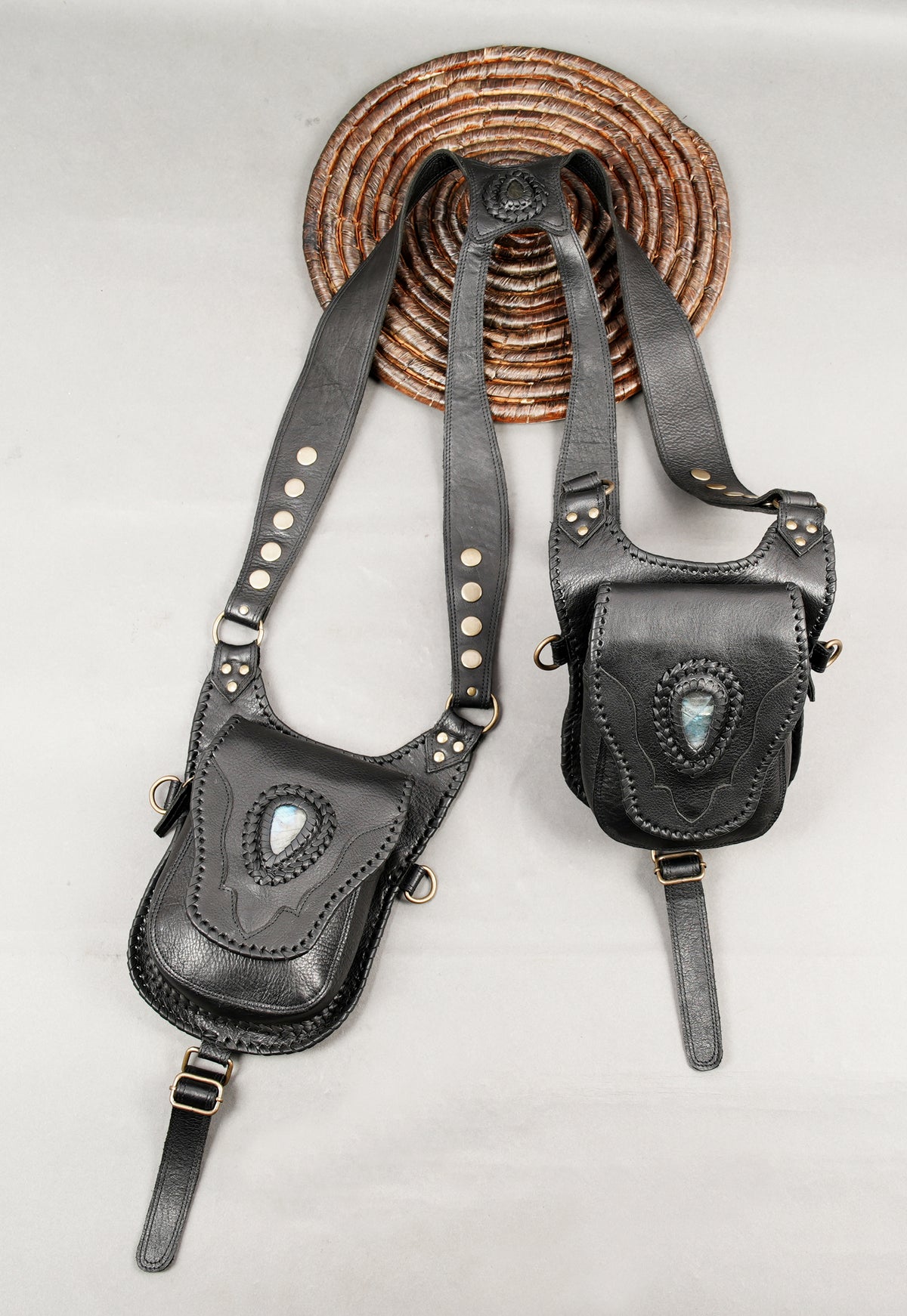 Black leather hip pouch set with labradorite stones and detailed hand stitching