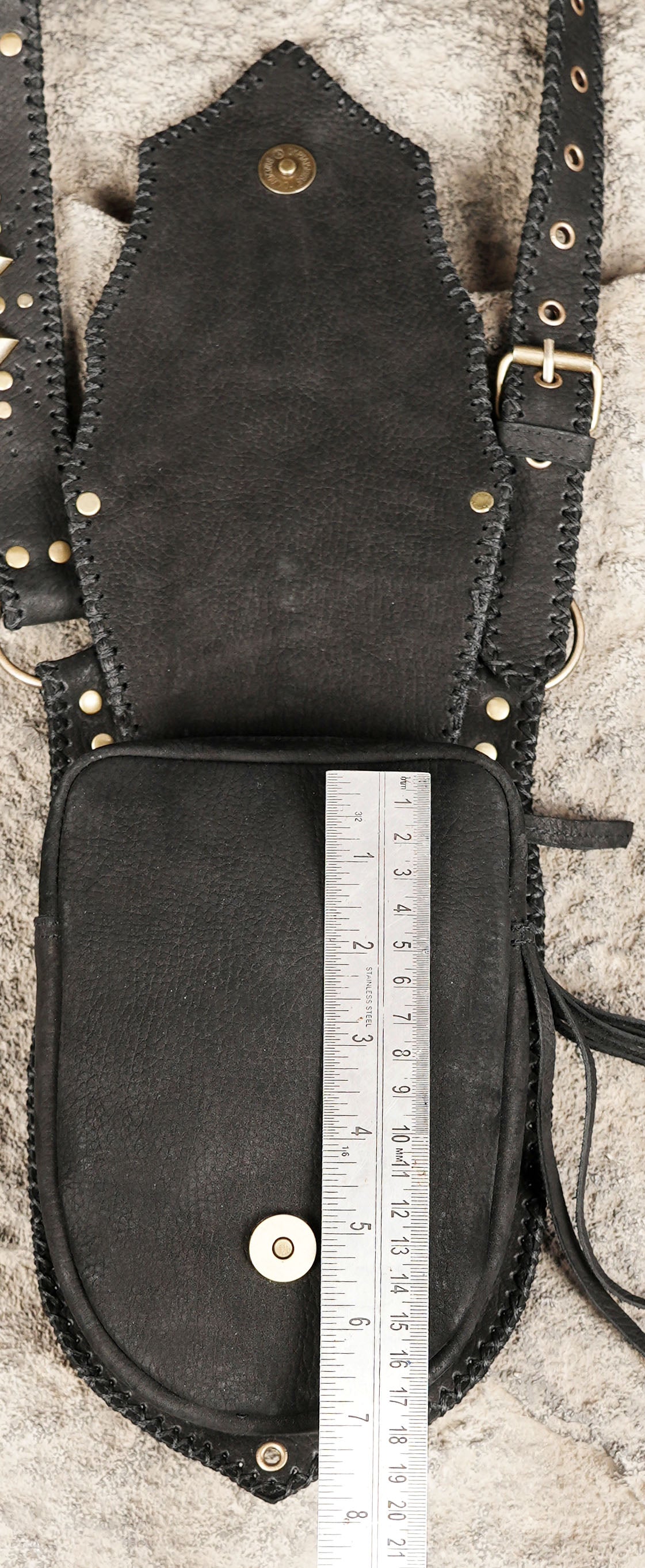 Black leather double pocket thigh holsters with silver-tone decorations for steampunk and gothic clothing.