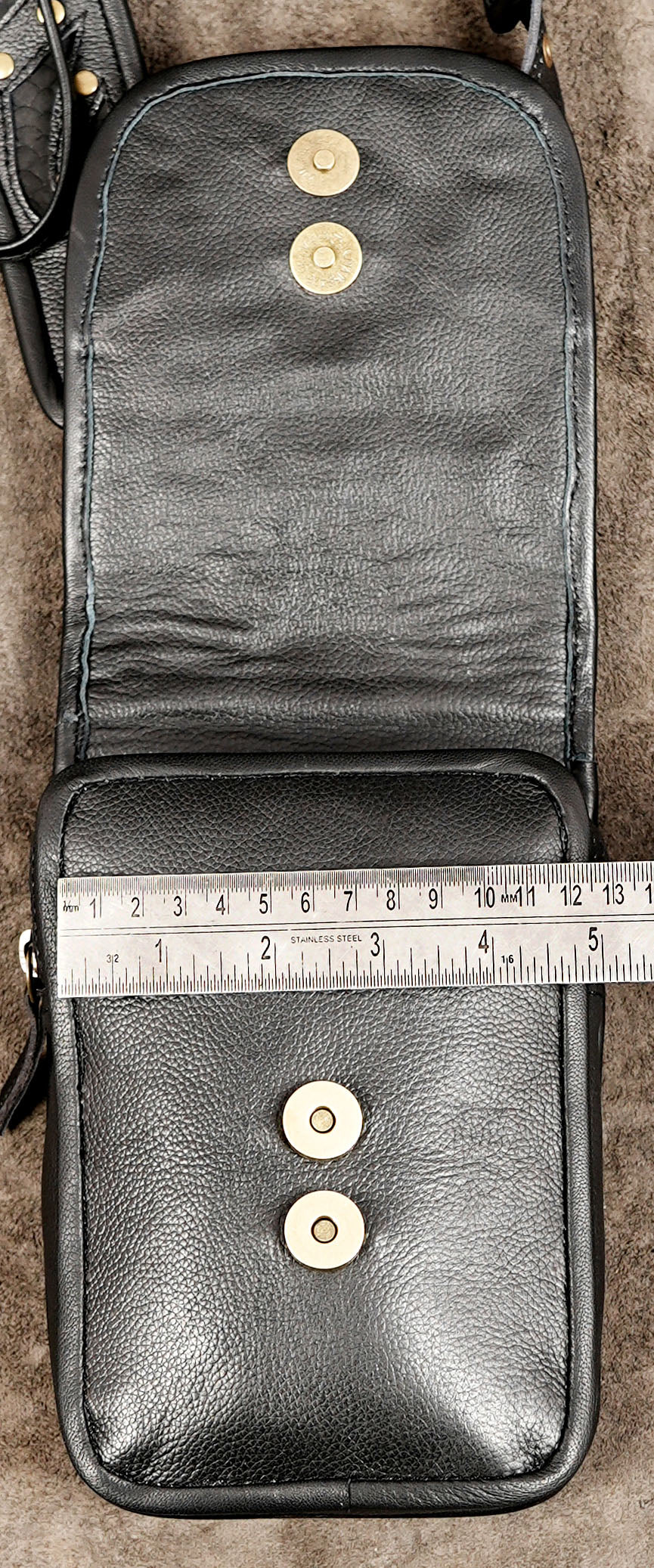 Black leather double holster style bag with adjustable shoulder straps