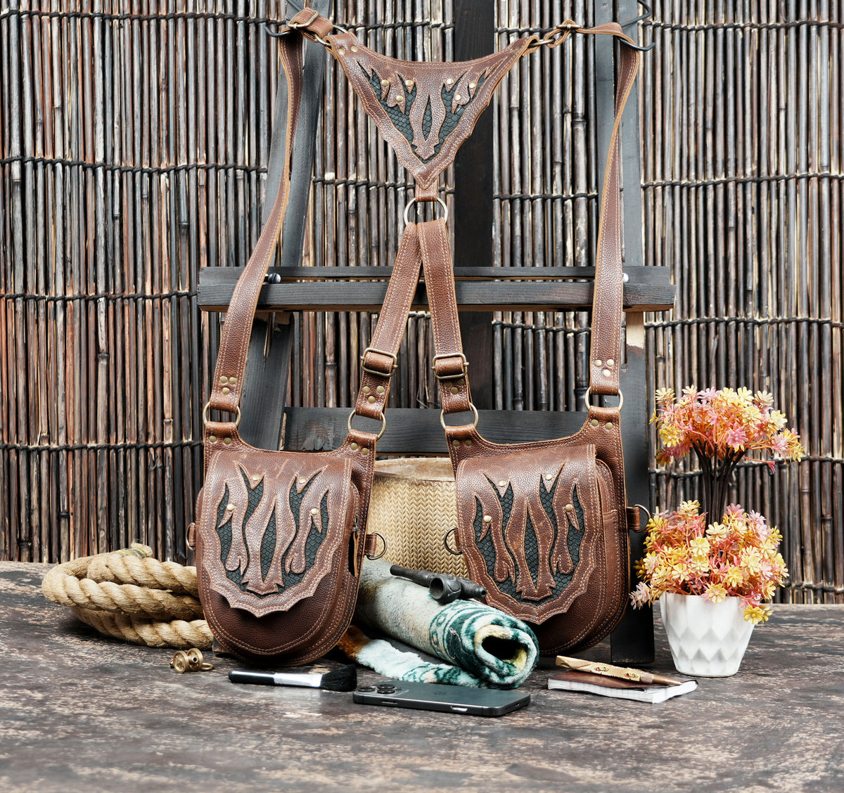 Alternative fashion harness with twin brown pouches and ornate flame detailing