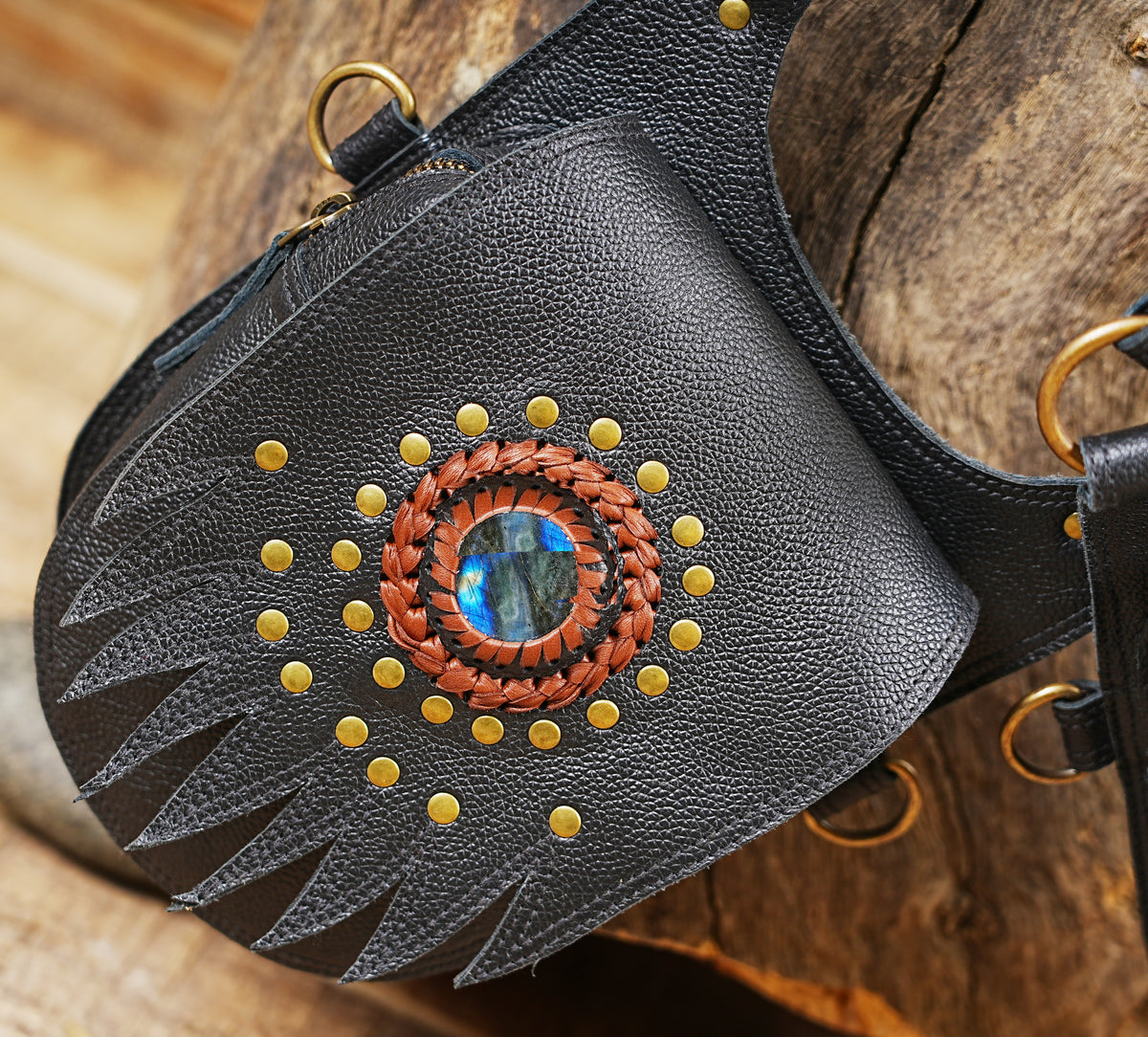 Black leather boho chest bag with gemstone pockets adjustable straps and utility storage