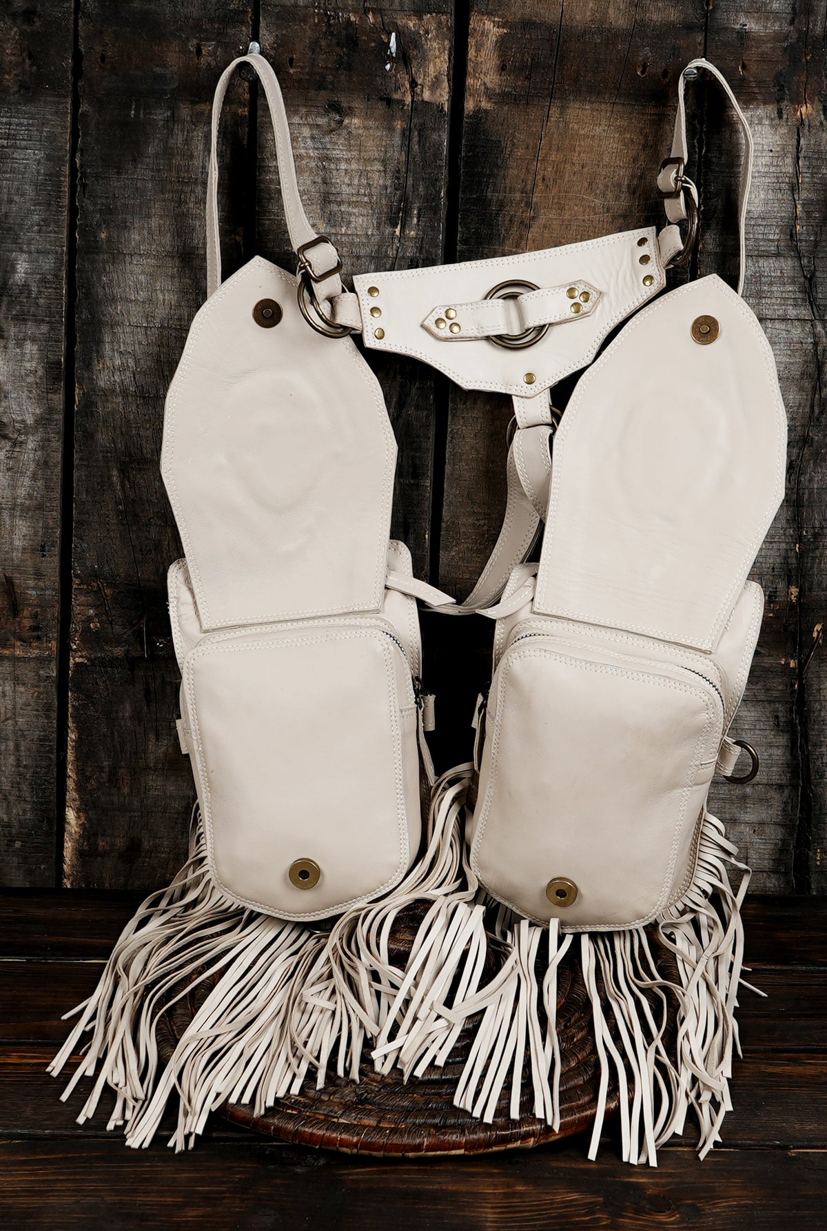 White leather utility harness with two hanging pouch bags