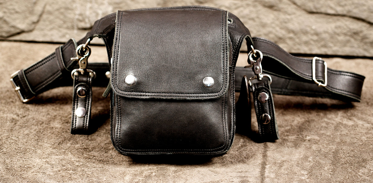Genuine leather waist bag styled on suede background