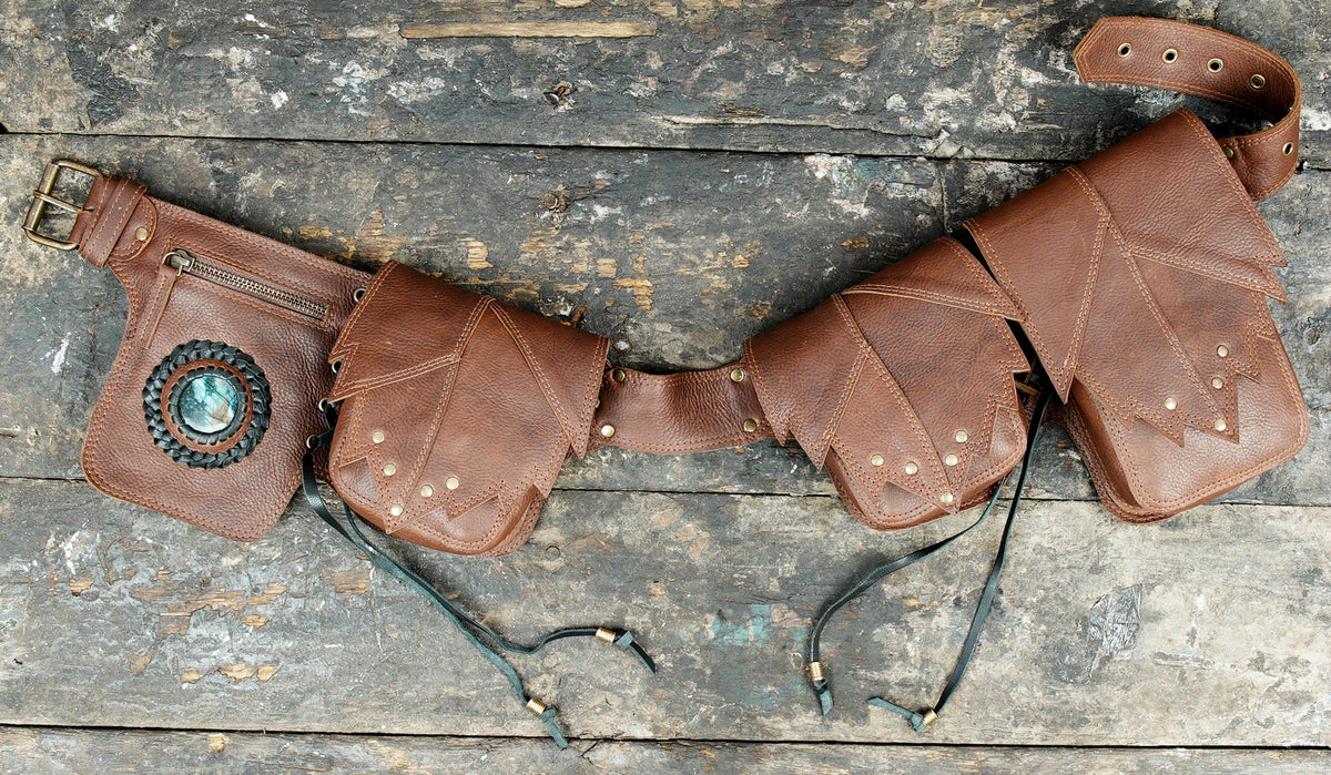 Artisan crafted leather waist accessory with brass studs