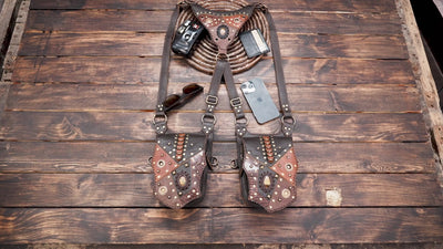 leather holster harness with adjustable straps and pockets