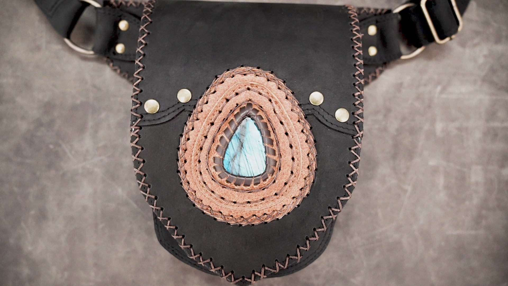 Leather utility waist belt with decorative stone centerpiece