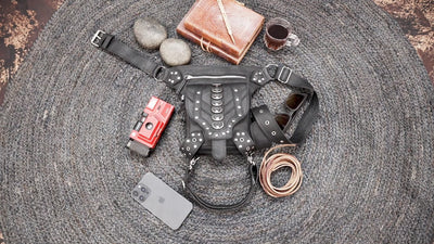 Handmade leather utility belt with thigh strap and silver hardware