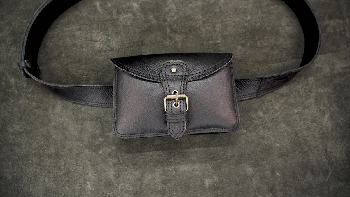 Unisex black leather bum bag with adjustable belt for everyday use