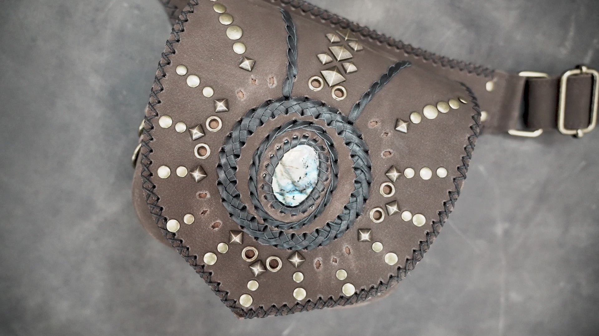 Tribal-inspired waist pouch with genuine stone centerpiece