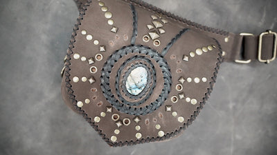Tribal-inspired waist pouch with genuine stone centerpiece