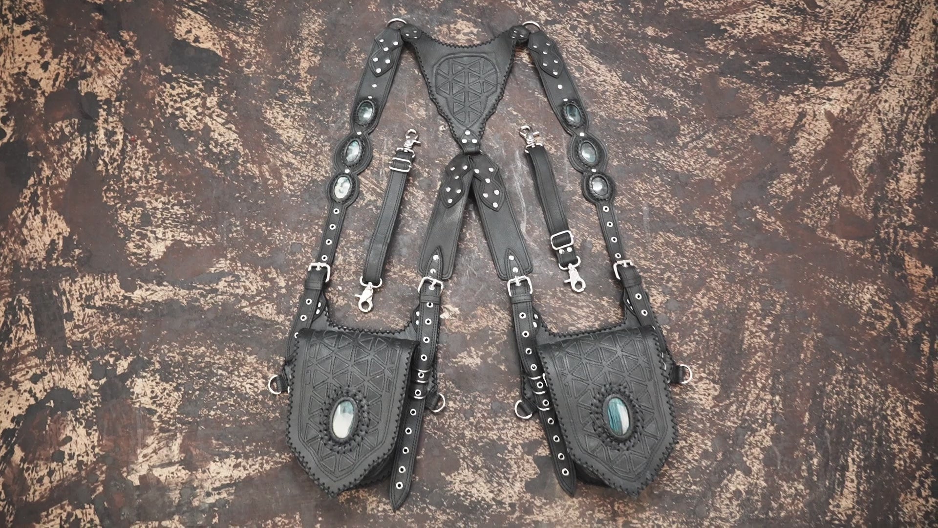 Artisan leather holster harness with adjustable straps and gemstone inlays