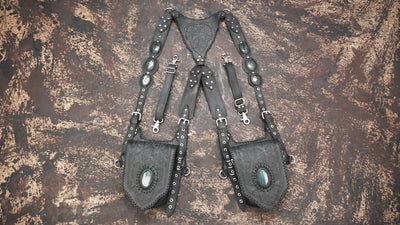 Artisan leather holster harness with adjustable straps and gemstone inlays