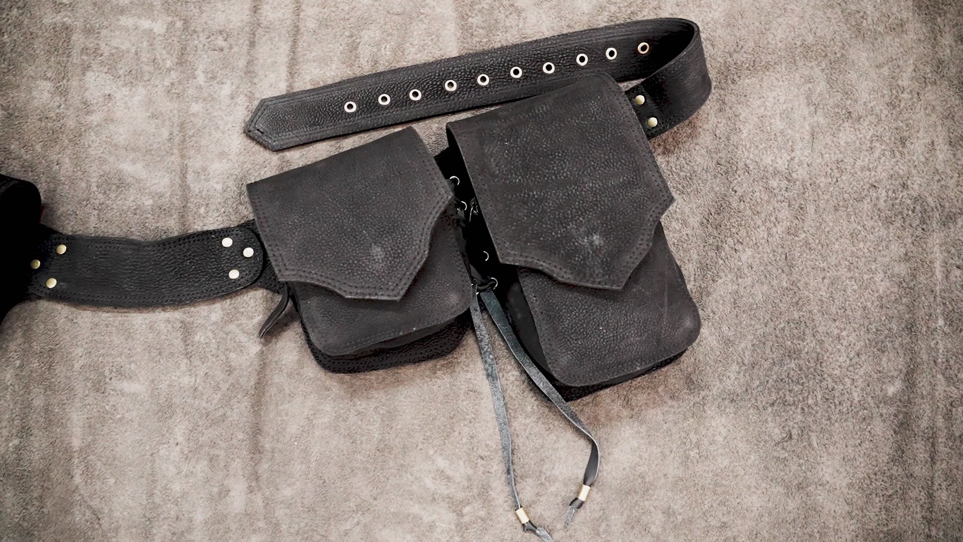 Black leather festival belt with detachable utility pockets