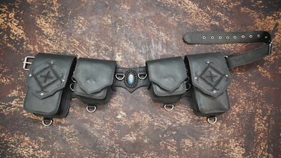 Black leather waist belt with metal ring details