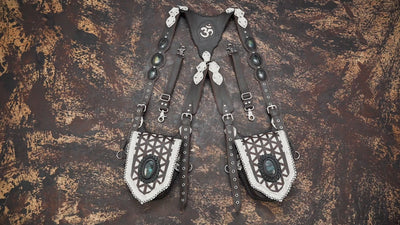 Artisan leather holster harness with tribal pattern and stone inlays