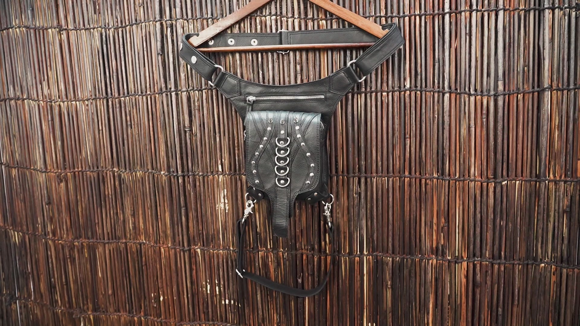 Handmade leather thigh holster belt with metal studs