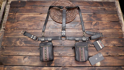 Steampunk black leather body harness with adjustable waist belt and two pouches   